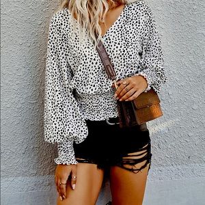 Nice white top with specks of black